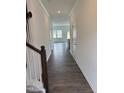 Inviting hallway with hardwood floors, leading to a bright, open living space at 269 Hank Way, Angier, NC 27501