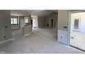 Open-concept living space with future kitchen and access to the porch at 2744 Rains Mill Rd, Princeton, NC 27569