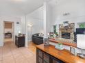 Inviting living room with stone fireplace, hardwood floors, and comfortable furniture at 310 Heidinger Dr, Cary, NC 27511