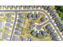 Overhead view of home in a landscaped neighborhood highlighting the roof and surrounding properties at 1085 Lobdale Ct, Burlington, NC 27215