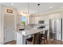 Modern kitchen featuring stainless steel appliances and a central island with seating at 1779 Walter Grissom Rd, Kittrell, NC 27544