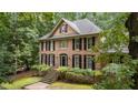 Beautiful brick home with black shutters and professional landscaping at 220 Dalton Dr, Raleigh, NC 27615