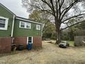 The rear of the house has plenty of room for parking at 2505 Chapel Hill Rd, Durham, NC 27707