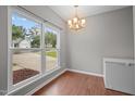 Bright dining area with a large window offering pleasant outdoor views at 612 Quartz Dr, Durham, NC 27703