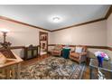 Charming living room features hardwood floors and traditional details at 7520 Milestone Ct, Raleigh, NC 27615