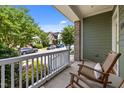 Relaxing front porch offering a serene view of the neighborhood and comfortable seating at 78 Salt Cedar Ln, Chapel Hill, NC 27516