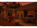 Spacious back patio with outdoor seating area and barbecue grill, perfect for entertaining and relaxation at 1357 Prevenient Dr, Wake Forest, NC 27587