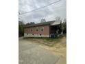 Another exterior view showcasing the architectural design and the outdoor space at 2509 Chapel Hill Rd, Durham, NC 27707