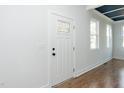 Bright entryway features a decorative glass door and modern trimwork at 2517 Newbold St, Raleigh, NC 27603