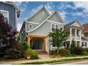 Beautiful home featuring a welcoming front porch and professional landscaping at 290 Quarter Gate Trce, Chapel Hill, NC 27516