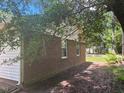 Side view of house and yard at 708 Old Barn Ave, Durham, NC 27704