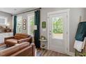 Inviting living area featuring comfortable seating, natural light, and stylish decor, creating a cozy atmosphere at 586 Great Ridge Pkwy, Chapel Hill, NC 27517