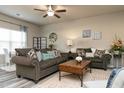 Comfortable living area with dual sofas, accent pillows, stylish lamps, and lots of decor at 1234 Sirius Drive Lot 31 Dr, Sanford, NC 27330