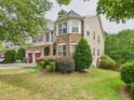 Beautiful two-story house showing the well-manicured lawn and landscaping at 1728 Callandale Ave, Cary, NC 27518