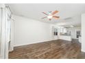 Spacious living area with hardwood floors and ample natural light, creating a warm and inviting ambiance at 307 Millbrook Dr, Pittsboro, NC 27312