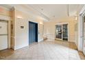 Spacious lobby with tile flooring, elevator access, and sliding glass doors at 324 Waterford Lake Dr, Cary, NC 27519
