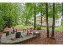 Secluded backyard features a firepit area perfect for relaxing outdoors at 4329 Hawksong Pl, Cary, NC 27518