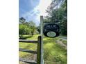 Address sign for 183 & 187 Birnamwood Drive marking property as a certified Bird Friendly Habitat at 183 Birnamwood Dr, Chapel Hill, NC 27516