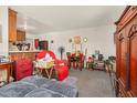Cozy living area featuring carpet, furnishings, and an open layout at 501 Magnolia Dr, Rocky Mount, NC 27801