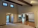Spacious living room showcasing an open layout, entryway, and modern kitchen at 507 Holtz Ln, Cary, NC 27511