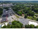 Overhead shot of property at 519 W Raleigh St in Siler City, near shops and tree-lined roads at 519 W Raleigh St, Siler City, NC 27344