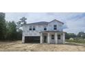 New construction two-story home featuring Tyvek HomeWrap and architectural details at 91 Caspian Ct, Lillington, NC 27546