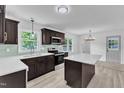 Stylish kitchen features stainless appliances, an island, and ample counterspace at 460 Bunn Elementary School Rd, Bunn, NC 27508