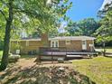 Expansive backyard deck perfect for outdoor entertaining and relaxation at 5614 Skyline Dr, Durham, NC 27712