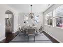 Bright dining area with stainless steel appliances and stylish décor for a contemporary living space at 684 Wickham Ridge Rd, Apex, NC 27539