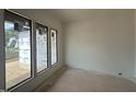 Bright room with large windows providing ample natural light, showcasing new construction interior at 10 Gambel Dr, Youngsville, NC 27596