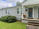 The building has a well-manicured lawn and flowers at 1500 Brent Ct # 9B, Burlington, NC 27215