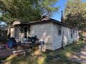 Exterior view of home with patio and modest features at 207 2Nd St, Erwin, NC 28339
