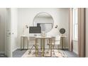 Stylish home office featuring a sleek desk, comfortable seating, and a large mirror, perfect for working from home at 215 Carova Bnd, Apex, NC 27539