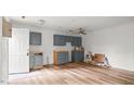 Spacious kitchen featuring new cabinets and hardwood floors at 2396 Spring Valley Rd, Henderson, NC 27537