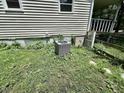 The house's exterior features an AC unit adjacent to the foundation at 4601 Orange Grove Rd, Hillsborough, NC 27278
