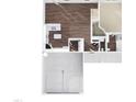 Open-concept floor plan featuring modern kitchen, staircase, and a large balcony at 2803 Ricolden Trl, Elon, NC 27244