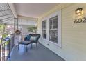 Inviting front porch with comfortable seating, offering a perfect spot for relaxation at 602 Dunbar St, Durham, NC 27701
