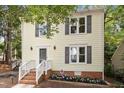 Attractive two-story home with a welcoming front porch and grey shutters at 1 Old Towne Pl, Durham, NC 27713