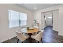 Cozy dining area with a round table and natural light at 1007 Sora Way, Durham, NC 27703