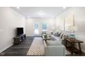 Bright and airy living room with stylish decor and ample seating at 1007 Sora Way, Durham, NC 27703