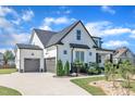 Charming two-story home with a two-car garage and well-maintained landscaping at 121 Nate Ct, Wake Forest, NC 27587