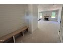 Bright living room under construction, featuring a fireplace and large windows at 145 Tee Dr, Selma, NC 27576