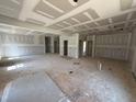 Spacious living room with fresh drywall, awaiting your personal touch and design at 145 Tee Dr, Selma, NC 27576