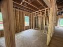Interior framing of a room, showcasing the structure and window placement at 5504 Jaeger Dr # 76, Graham, NC 27253