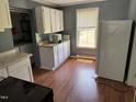 An ample kitchen provides plenty of space for cooking and storage at 709 Gerard St, Durham, NC 27701