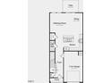 Floor plan showcasing the first floor with a kitchen, dining, living area, and one-car garage at 8763 Wardle Ct, Wake Forest, NC 27587