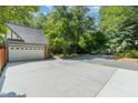 Spacious detached garage with concrete driveway at 106 Wolfs Trl, Chapel Hill, NC 27516