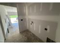 Dedicated laundry room featuring new drywall and available hookups at 183 Tee Dr, Selma, NC 27576