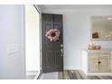 Bright entryway featuring a welcoming front door and stylish decor accents at 2264 Jollay St, Durham, NC 27703