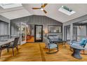 Inviting sunroom with vaulted ceilings and ample natural light at 128 Shadowbrook, Pittsboro, NC 27312